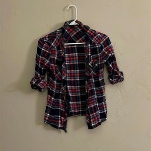 Plaid button down top.
